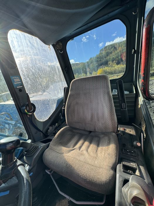 Колесен багер Atlas