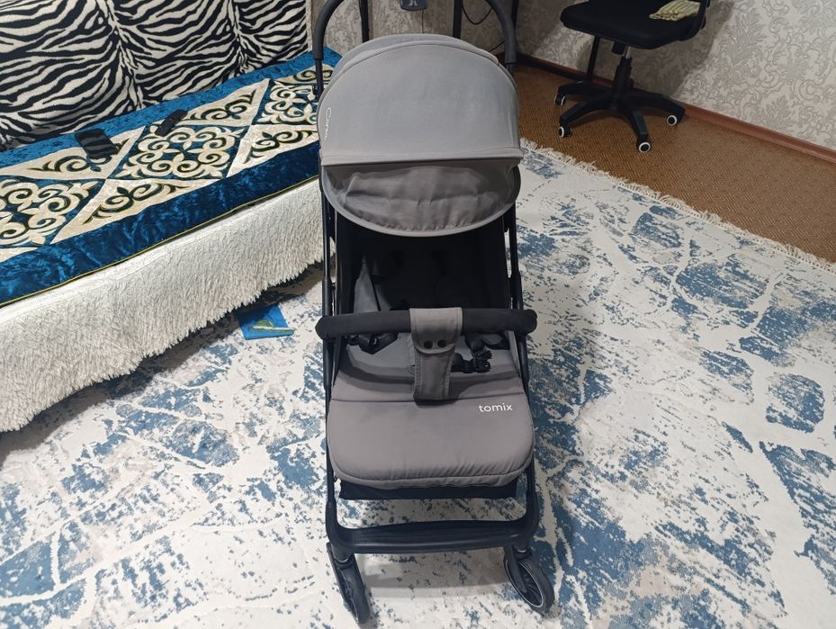 Продам прогулочную коляску TOMIX Corsa