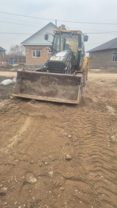 Услуги экскаватора 3 в 1 CAT