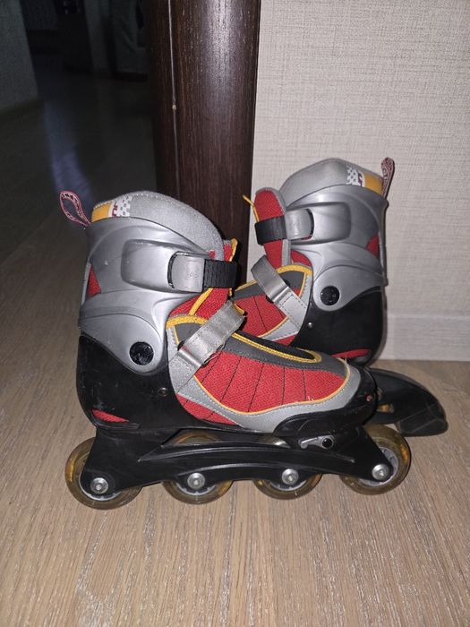 Роликовые коньки