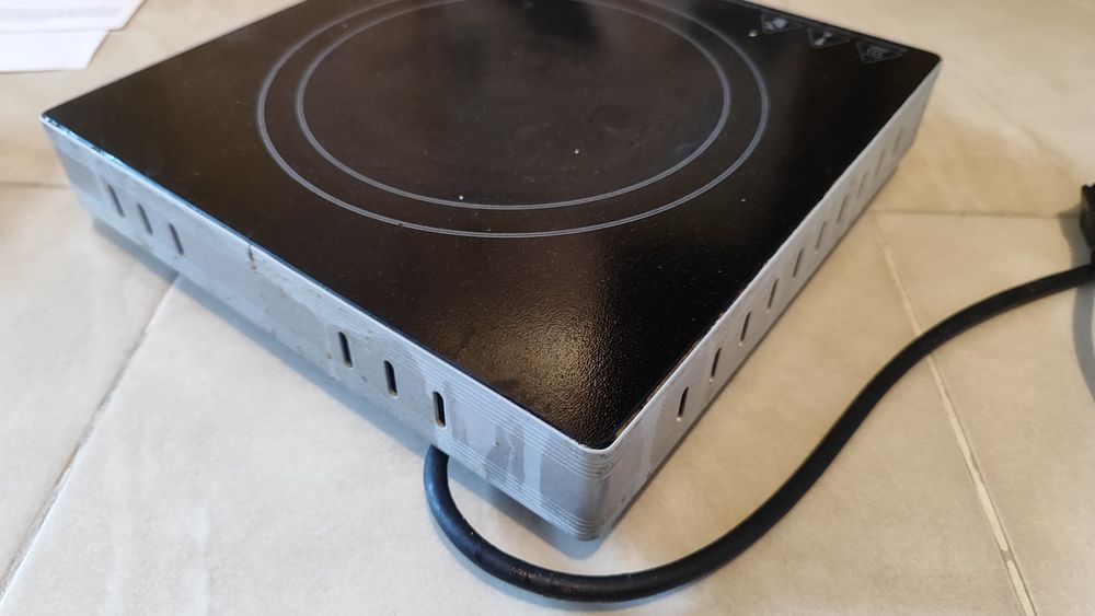 Керамичен котлон Muhler MHP-2099IS, 2000 W - работещ.