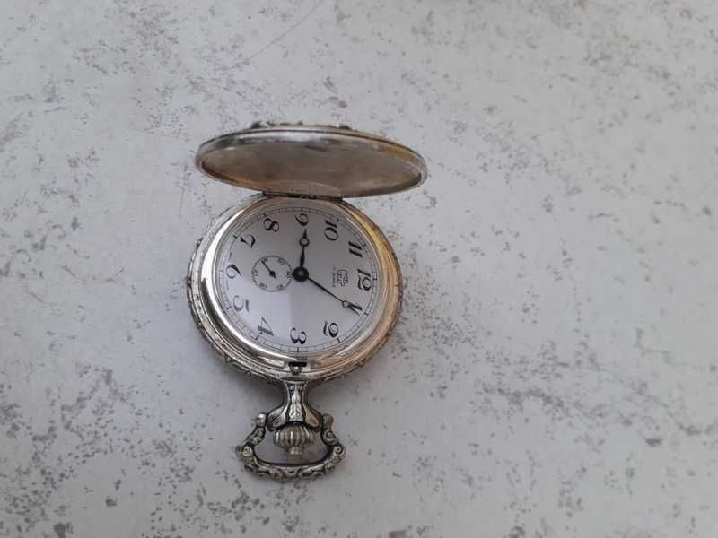 Ceas de buzunar vintage gravat manual

pret; 350lei/buc