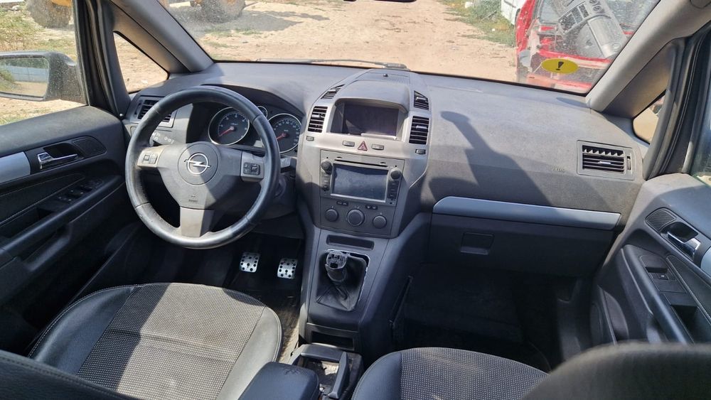 Opel zafira motor cutie faruri capota bara aripa aripi far usi usa portbagaj hayon oglinda scaune interior armatura volan stop stopuri roti jante