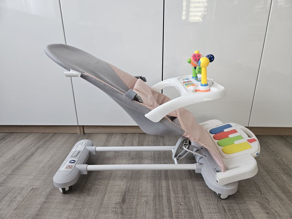 Balansoar bebeluși NiceKids, roz, pliabil, cu pian și jucării