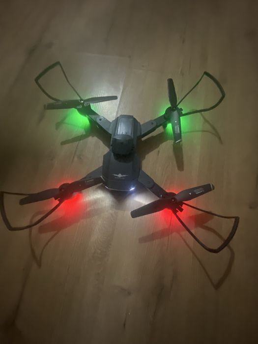Dronă pliabilă cu cameră HD + geantă transport – stare foarte bună