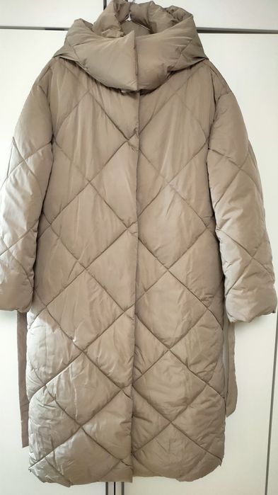 Продам пуховик новый