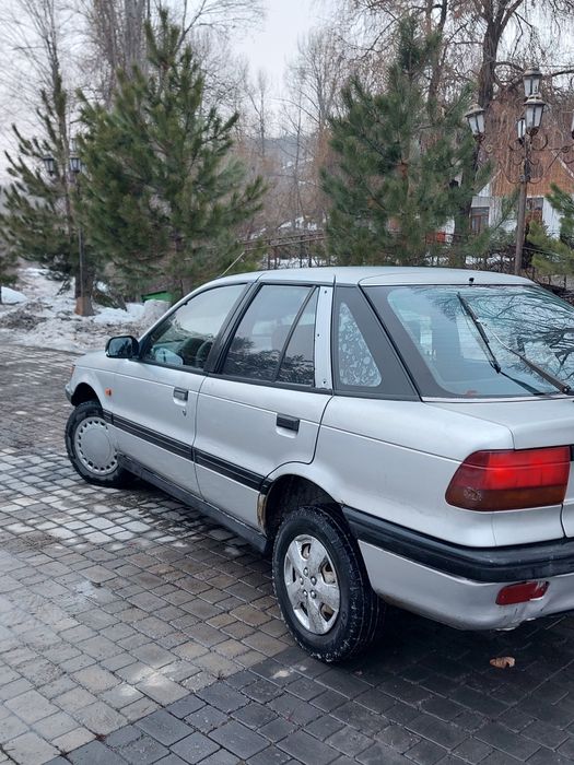 Продам митсубиси лансер.