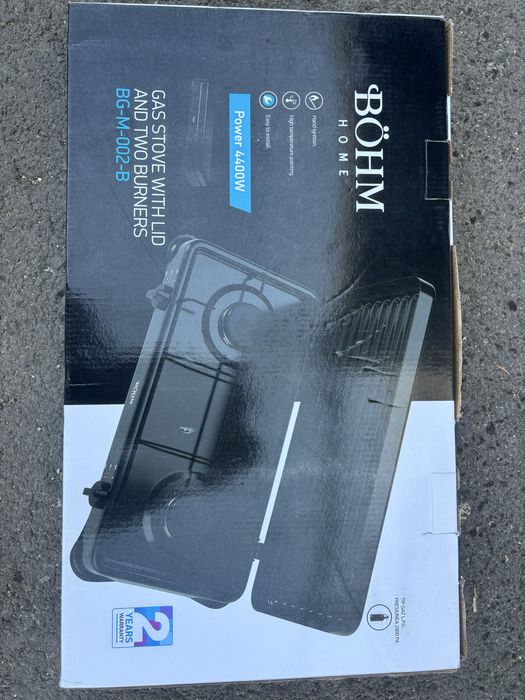 Aragaz pe masă cu două ochiuri pentru butelie , negru , alb .