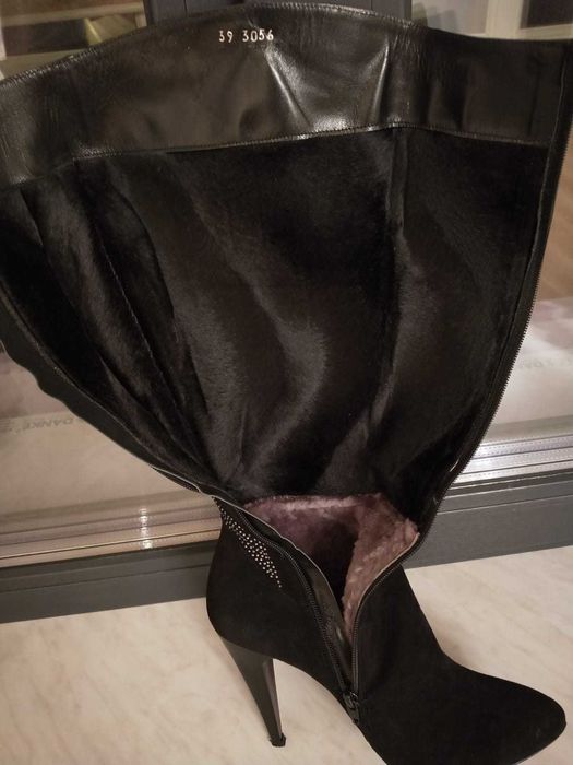 Продам зимние Сапоги.