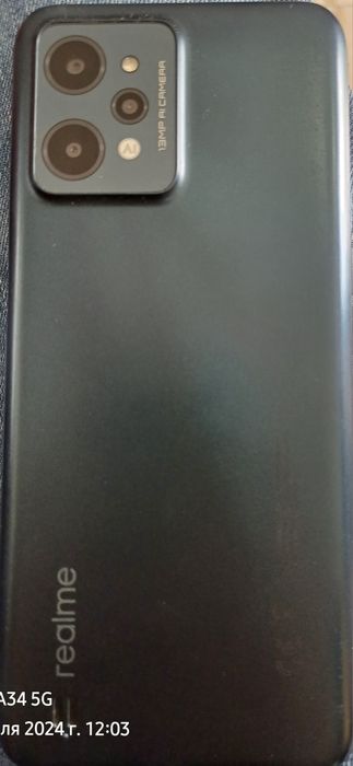 Телефон Realmi c31.