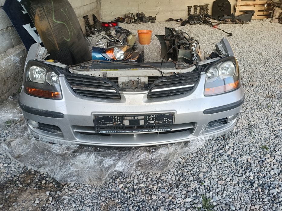 фары nissan almera тино