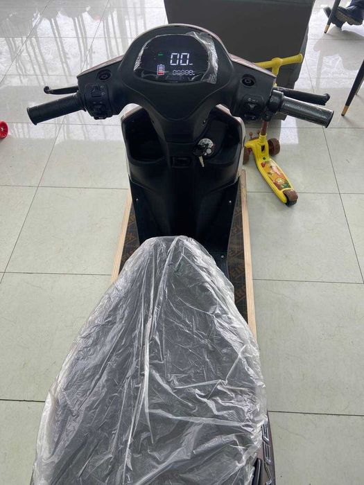 скутер на литиевой батарее EVEGA/lition batareyyali skuter EVEGA