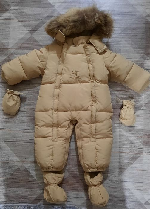 Продам новый зимний комбинезон детский