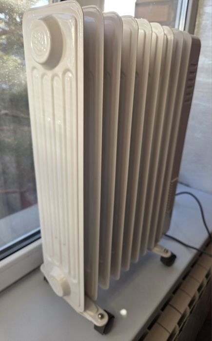 Обогреватель масляный новый