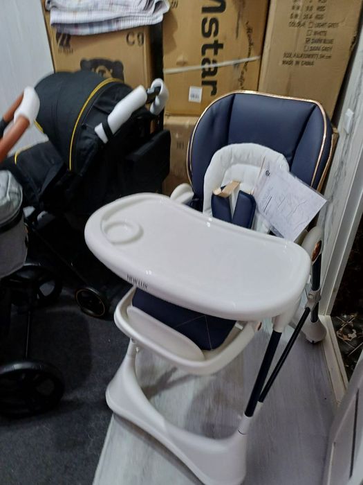 Продаётся фирменный кормление стульчик новый