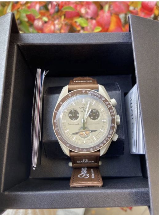 Часы Swatch & Omega mission to saturn