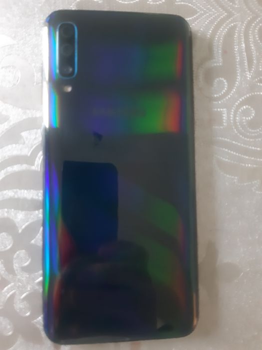 Самсунг А 50/ 64 гб. Редми 10 а