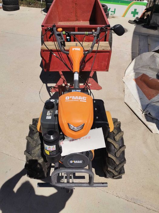 Motocultor O'MAC MC 12000E-D echipat cu remorca foarte incapatoare cu frana de picior
