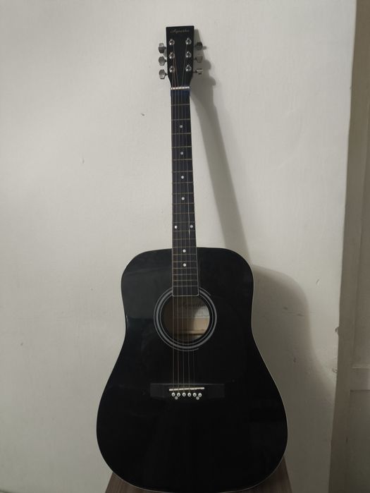 Акустическая гитара