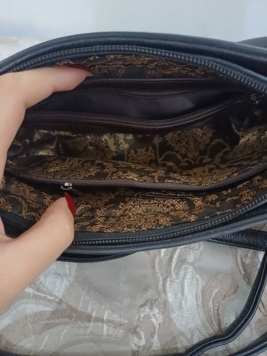 Кожаная сумочка с ремешками