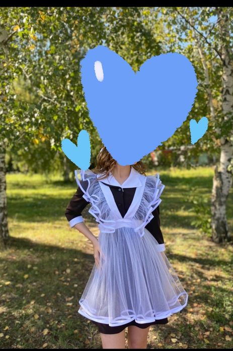 Новые школьные фартуки.