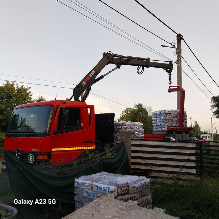 Transport-Basculabil cu macara.12t..