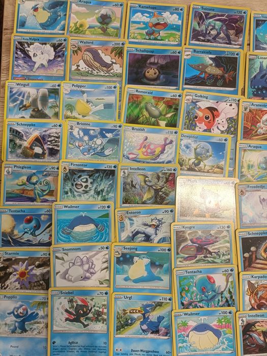 600 de cărți pokemon originale + patru cutii de metal