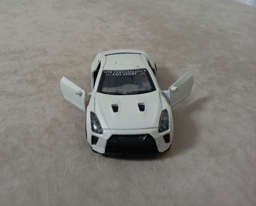 Железная машинка Nissan gtr am3 sport игрушка.