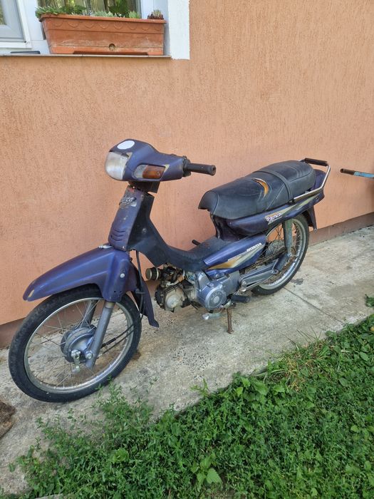 Honda motor 4 timpi