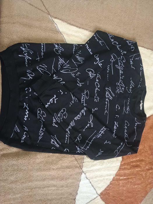 Bluză de culoare neagră de la Regata, livrare prin poștă