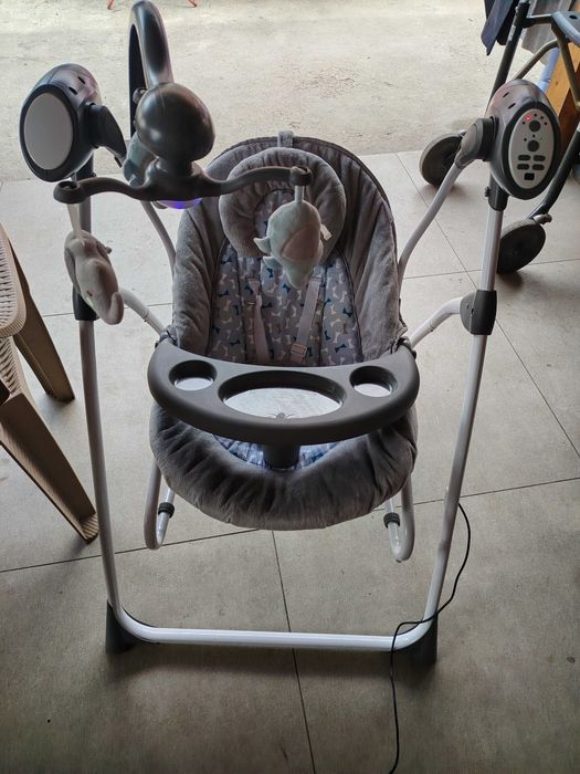 Balansoar electric de bebeluși