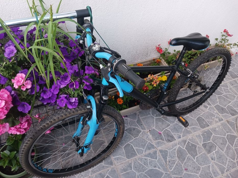 Vând bicicletă B twin roti 24"