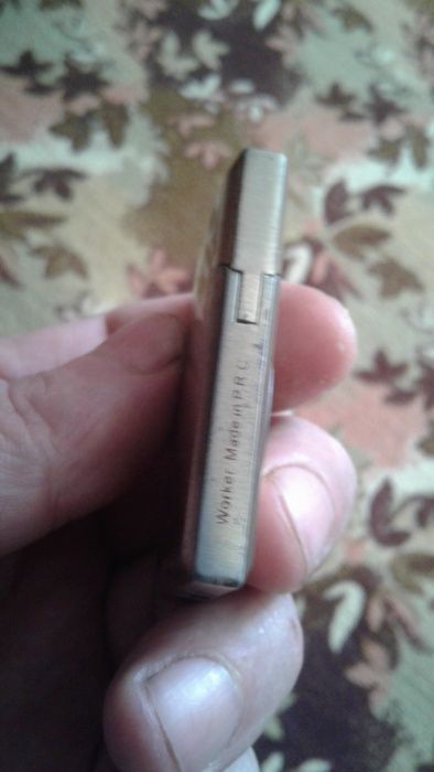 Зажигалка газовая