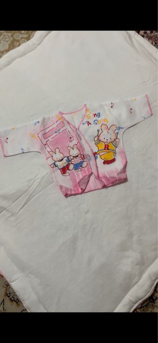 Одежды для новорожденных