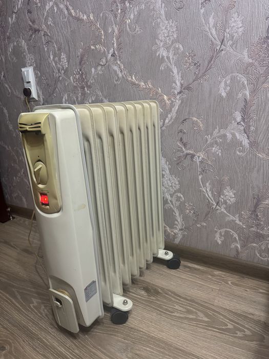 Масляный обогреватель.
