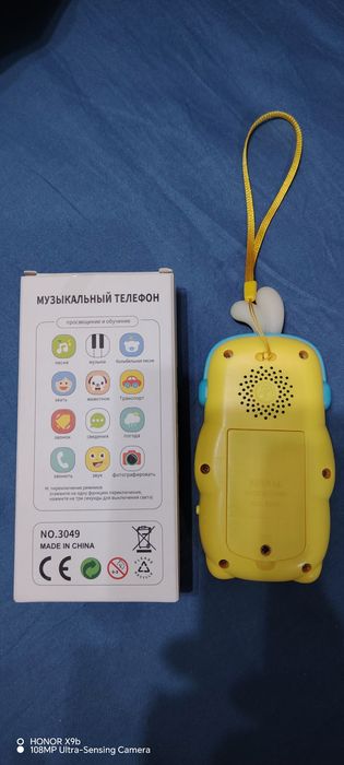 Продам детский музыкальный телефон