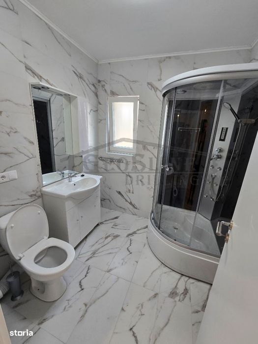 Apartament 2 dormitoare 1 open-space Parcare subterană privată inclusă