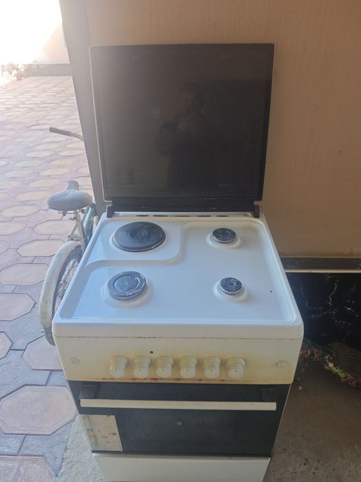 Газ плита 3/1 сотилади