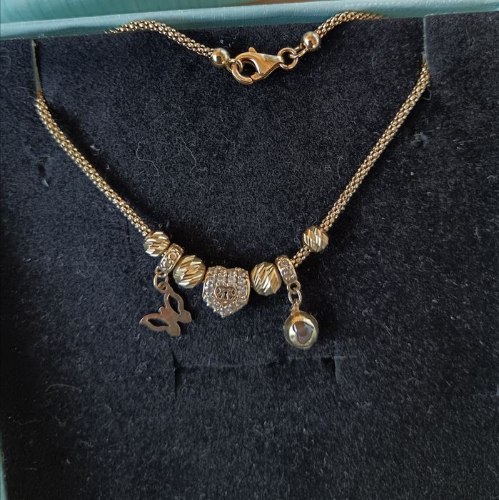 Продавам златна гривна пандора 14карата