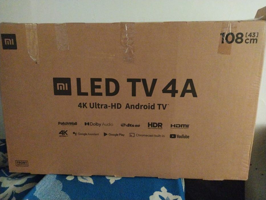 Продам MI TV, швейную машину и оверлог
