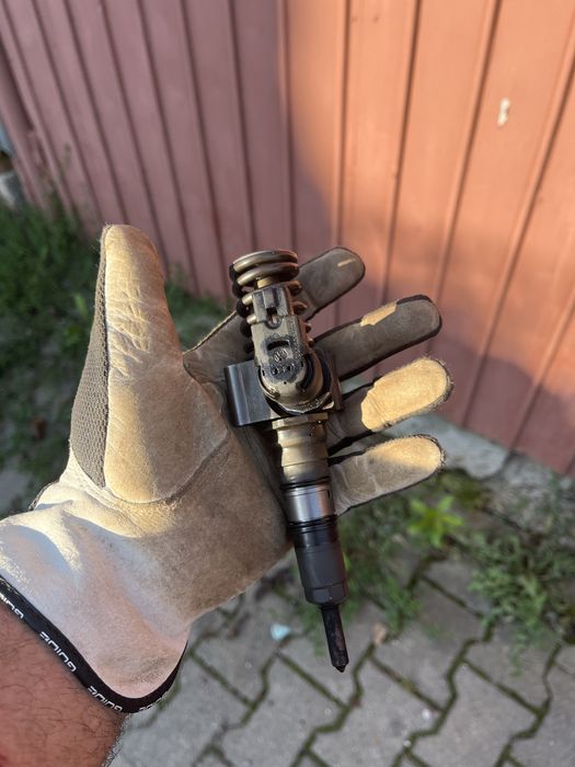 Injectoare Passat b6