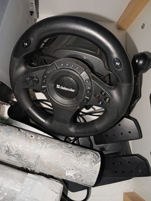 Продам PlayStation 3,руль ,и диски.