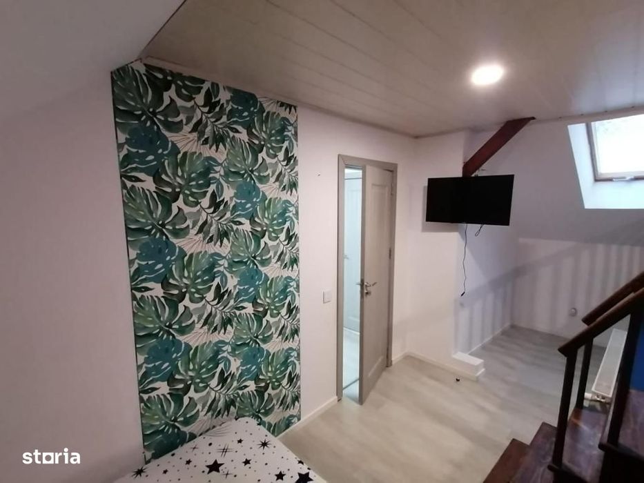 Apartament cu 3 camere - curte cu foisor + spatiu parcat masina