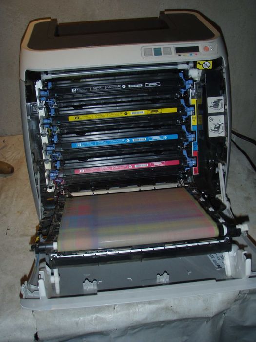 Imprimanta laser color cu placa de retea HP 1600, murdareste foaia