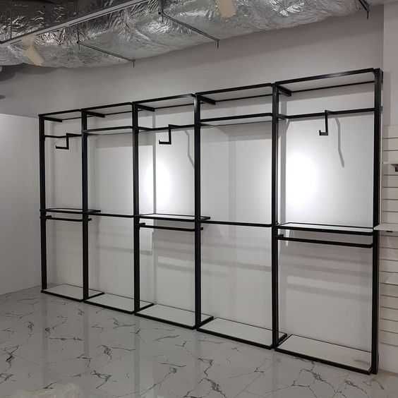 Рейлы, стеллажи, ресепшн, вешала, примерочные, столы на заказ