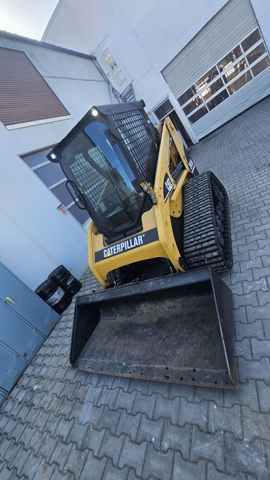 Caterpillar miniîncarcator bobcat încărcător
