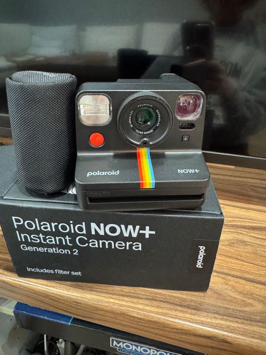 Фотоапарат   за моментни снимки на Полароид