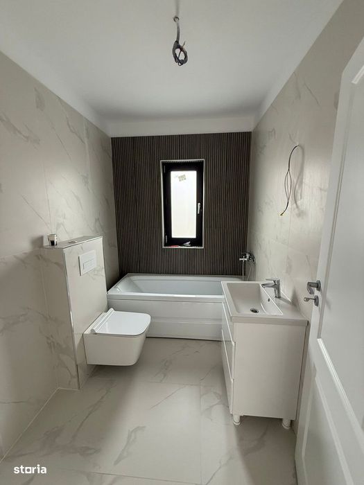 Casa pe parter cu 4 camere , incalzire in pardoseala , teren 400 mp