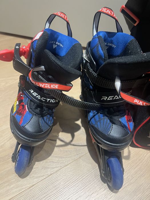 Роликовые коньки