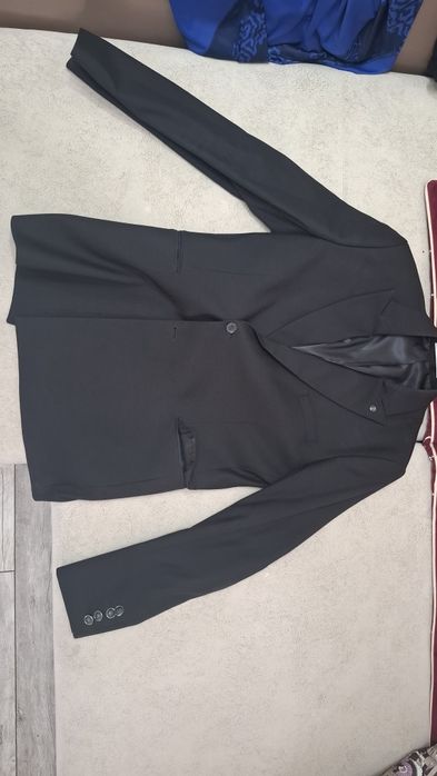 Продам костюм 48 размера